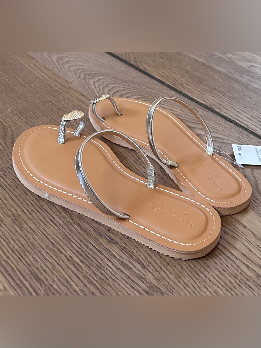 NWT. Calypso St. Barth Gold Shell-Toe Toe-Loop Sandals with Tan Footbed size 9M